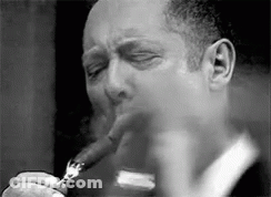 Man Smoking Cigar Eyes Closed GIF
