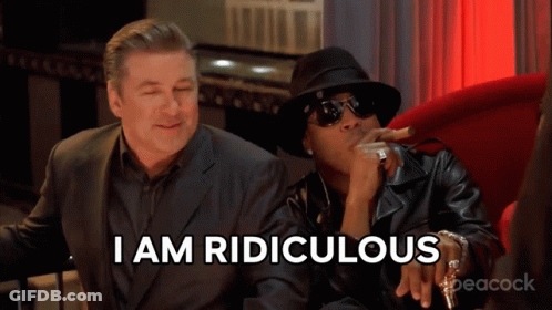 Man Smoking Cigar Next To Another Man Saying I Am Ridiculous GIF