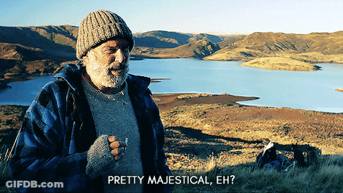 Man Smoking Cigarette By Lake Says Pretty Majestical GIF