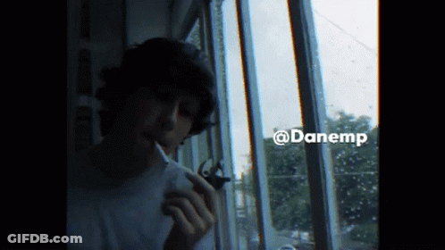 Man Smoking Cigarette By Window @Danemp GIF