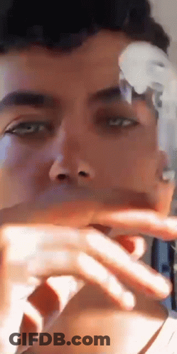 Man Smoking Cigarette Close Up GIF