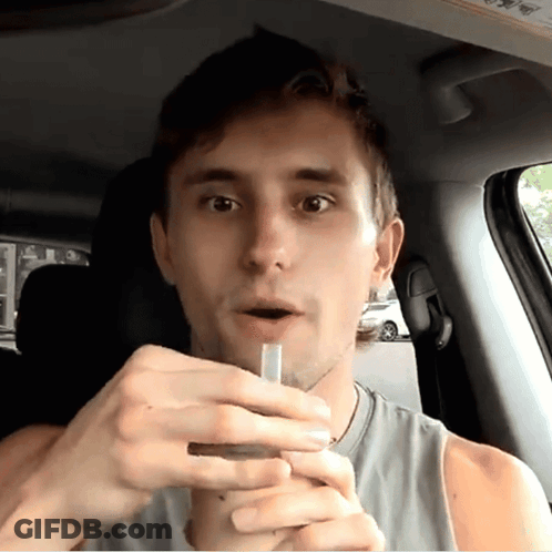 Man Smoking Cigarette In Car GIF