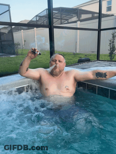 Man Smoking Cigarette In Hot Tub GIF