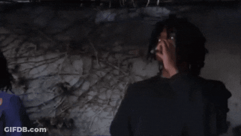 Man Smoking Cigarette Next To Martin Cup GIF