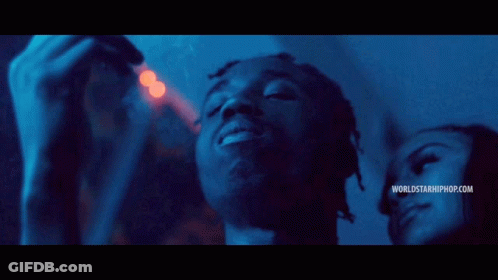 Man Smoking Cigarette Next To Woman WorldStarHipHop GIF