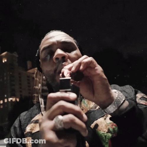 Man Smoking Cigarette With Lighter GIF