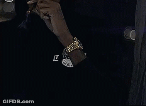 Man Smoking Cigarette With Watch GIF