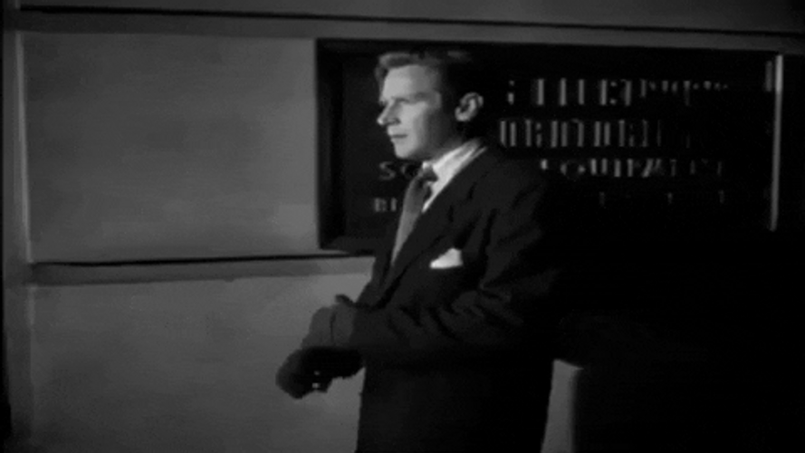Man Smoking During 40S GIF