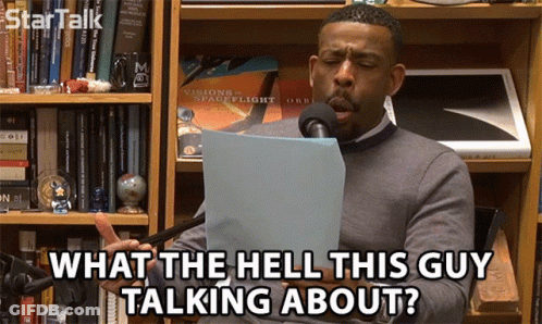 Man Speaking Into Mic Saying What The Hell This Guy Talking About GIF