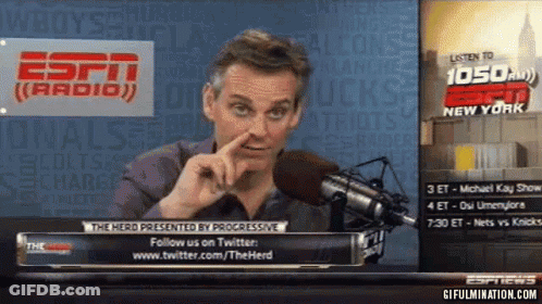 Man Speaking Into Microphone In Front Of ESPN Radio Sign GIF