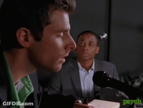 Man Speaking Into Microphone Saying Banana GIF