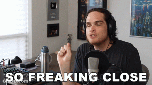 Man Speaking Into Microphone Saying So Freaking Close GIF