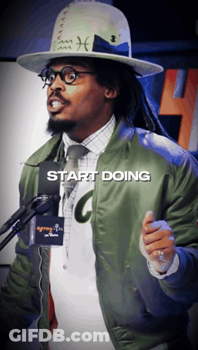 Man Speaking Into Microphone Saying Supposed GIF