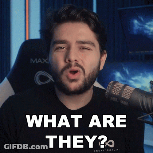Man Speaking Into Microphone Saying What Are They GIF