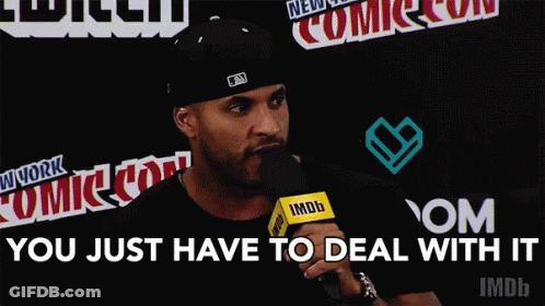Man Speaking Into Microphone Saying You Just Have To Deal With It GIF