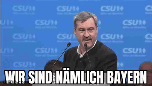 Man Speaking Into Microphone Wir Sind Namlich Bayern GIF
