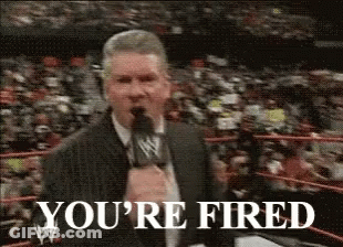 Man Speaking Into Microphone You're Fired GIF