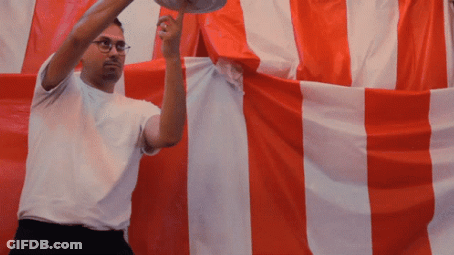 Man Spinning Plate With Finger GIF