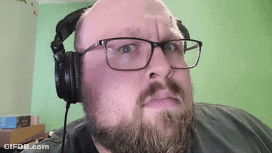 Man Squint Look With Glasses GIF