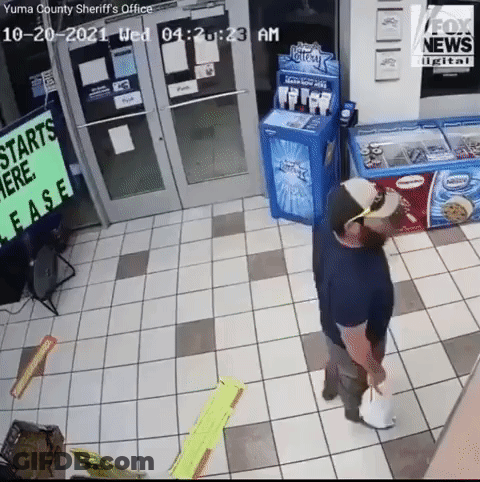 Man Standing At Lease Sign GIF