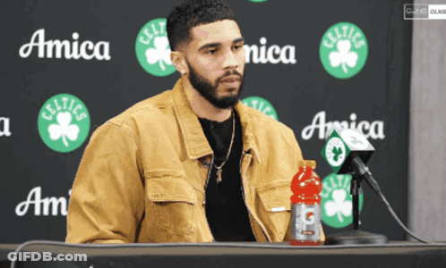 Man Standing At Microphone With Gatorade GIF