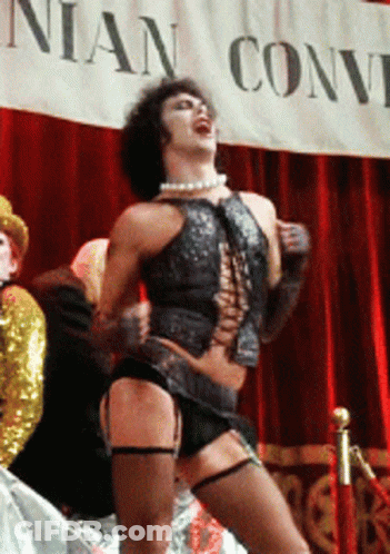 Man Standing At Nian Convention Banner GIF