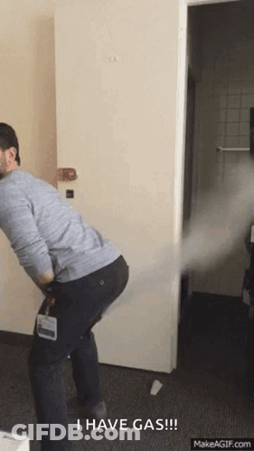 Man Standing Before Door With I Have Gas GIF