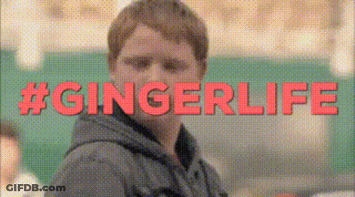 Man Standing Before Green Wall With Gingerlife GIF