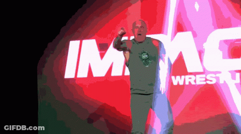 Man Standing Before Img Wrestl Sign GIF