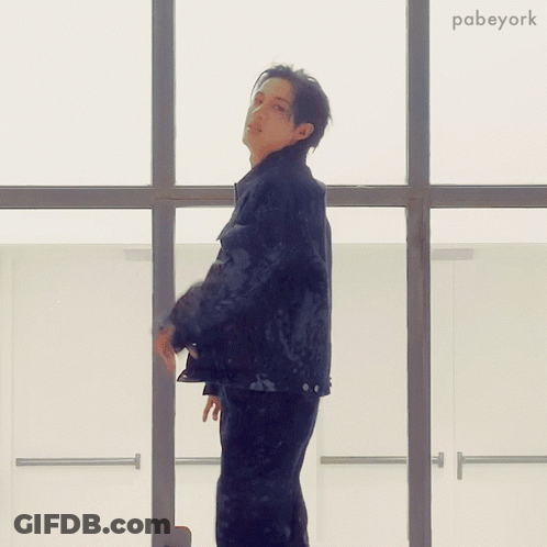 Man Standing Before Large Window With Pabeyork GIF