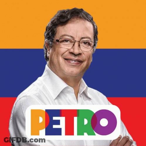 Man Standing Before Petro Flag GIF