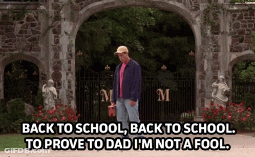 Man Standing Before Stone Archway GIF