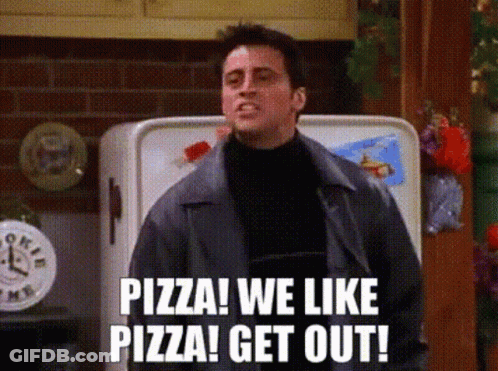 Man Standing By Refrigerator Saying Pizza GIF