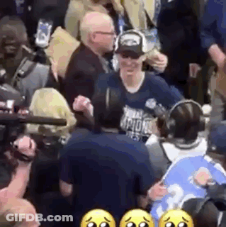 Man Standing In Crowd GIF