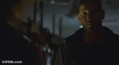 Man Standing In Dark Room GIF