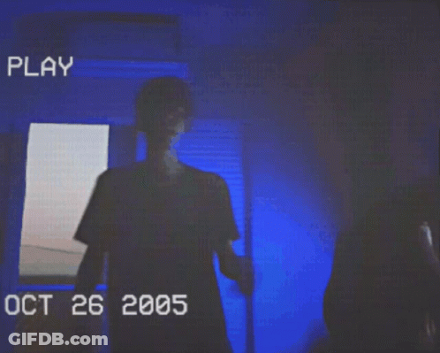 Man Standing In Dark Room Oct 26 2005 GIF