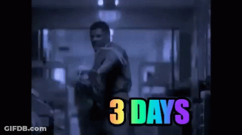 Man Standing In Dark Room With 3 Days Rainbow GIF