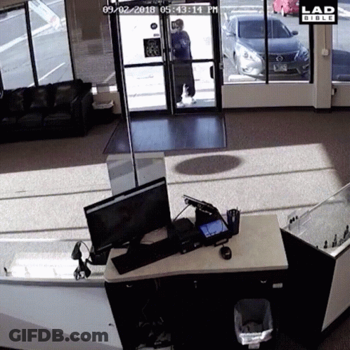 Man Standing In Doorway GIF