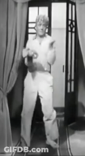 Man Standing In Doorway GIF
