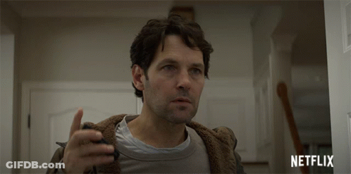 Man Standing In Doorway With Netflix Logo GIF