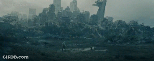 Man Standing In Earthquake-Damaged City GIF