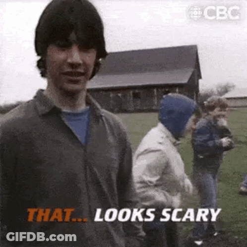 Man Standing In Field With Group Of People GIF
