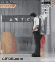 Man Standing In Front Of 4Gifs.com Sign GIF