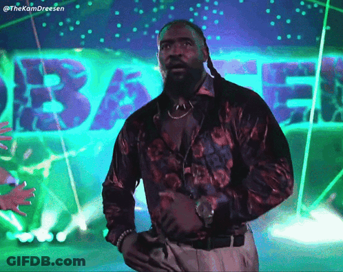 Man Standing In Front Of Bae Sign GIF