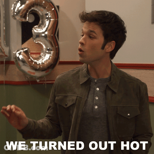 Man Standing In Front Of Balloons With We Turned Out Hot GIF