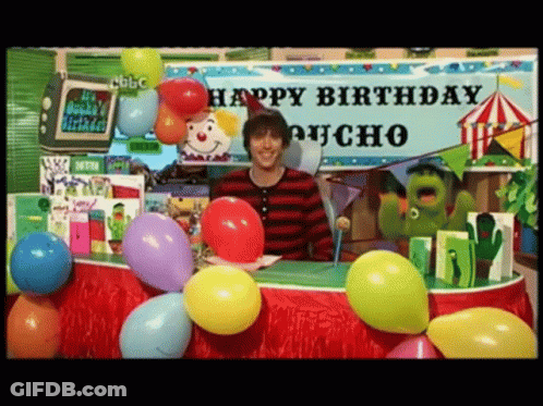 Man Standing In Front Of Birthday Poncho Sign GIF