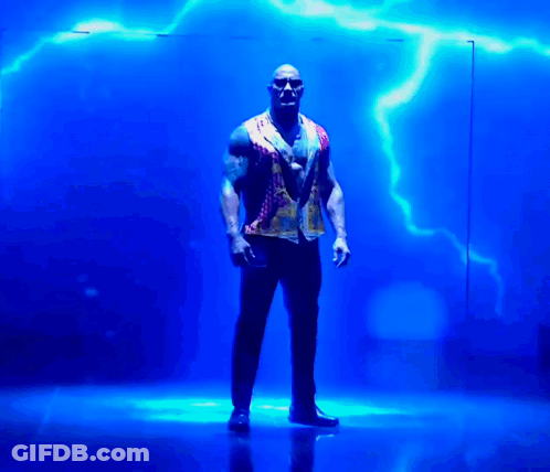 Man Standing In Front Of Blue Lightning Strike GIF