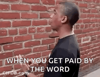 Man Standing In Front Of Brick Wall GIF