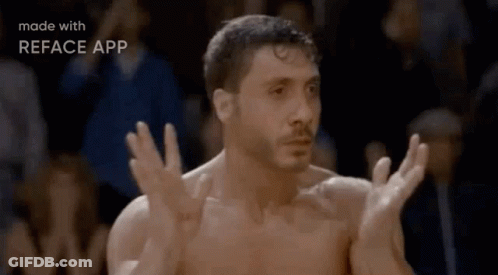 Man Standing In Front Of Bricks GIF