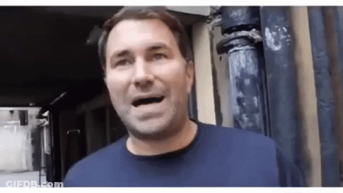 Man Standing In Front Of Building Mouth Open GIF